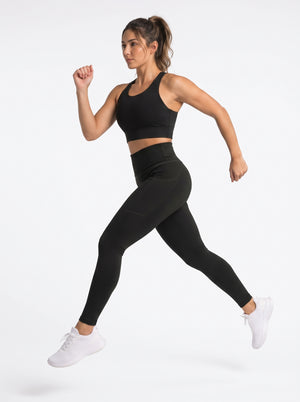 Black high-waisted pocket leggings by Proven Sportswear, showing the fitted design and functional side pockets.