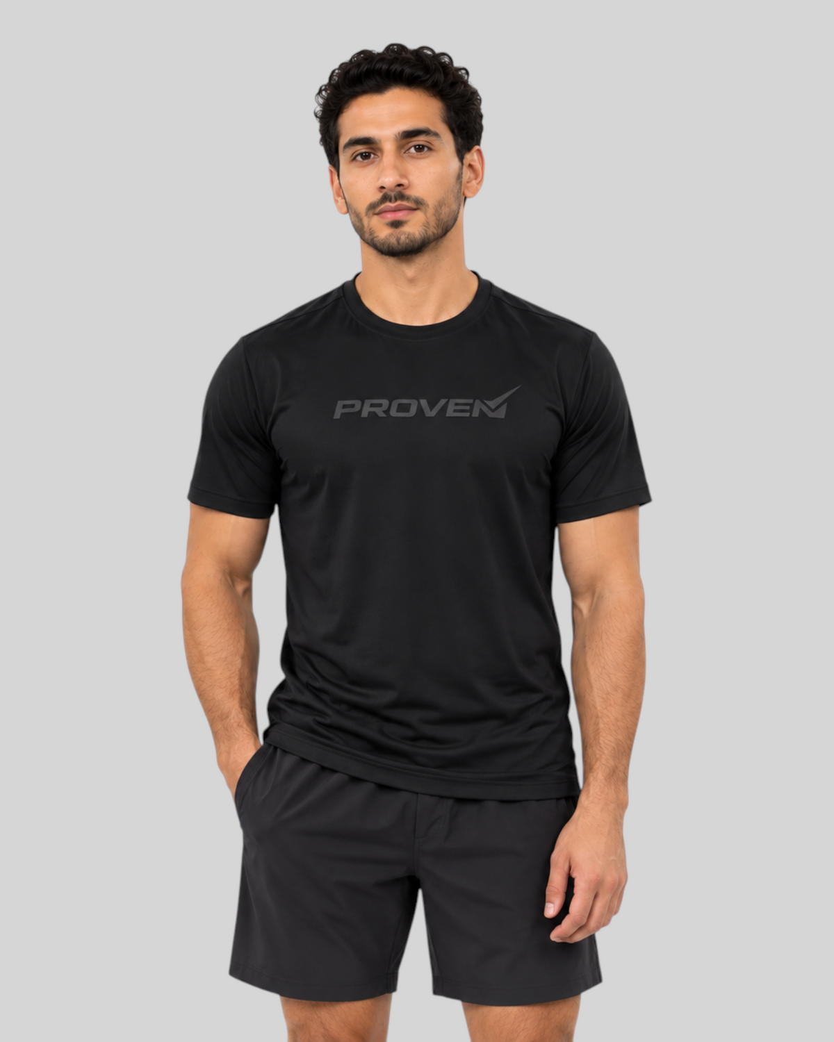 Black Proven Sportswear performance sports T-shirt displayed on a hanger, highlighting its sleek athletic design.