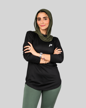 Long sleeve Proven Sportswear performance sports T-shirt with moisture-wicking fabric and athletic fit, shown on a model.