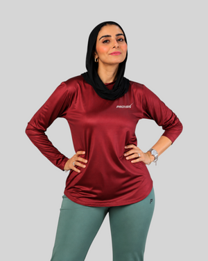 Maroon long sleeve performance sports T-shirt by Proven Sportswear, featuring breathable fabric and athletic fit.