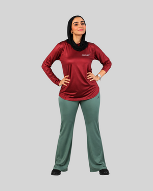 Maroon long sleeve performance sports T-shirt by Proven Sportswear, shown on a mannequin highlighting its fitted design and breathable fabric.