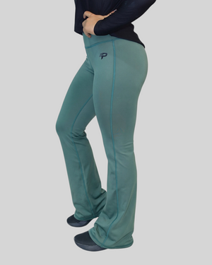 Olive green flare leggings by Proven Sportswear, showing the stylish, fitted design with flared hems on a model.