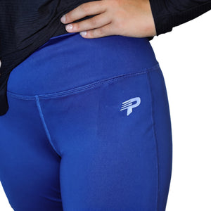 Navy blue flow flare leggings by Proven Sportswear, showcasing their stylish fit and flare design on a model.