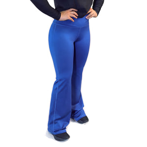 Navy blue flare leggings from Proven Sportswear with a high waist and comfortable fit, shown on a model.