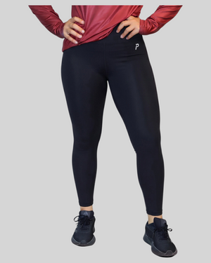 proven sport wear black high-waisted leggings with side pockets and tummy-control waistband on a model