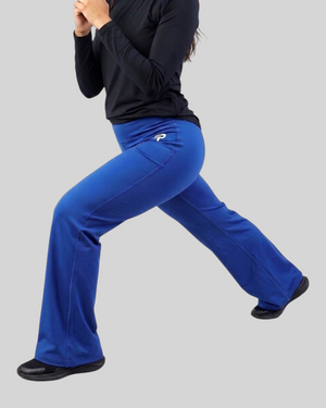 proven sport wear blue high-waisted flared leggings with signature logo, worn by a model in a lunge position