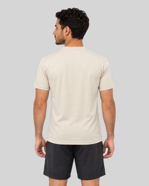 Desert Sand Proven Sportswear Essential Performance T-shirt displayed on a hanger, showcasing a lightweight, breathable sports tee.