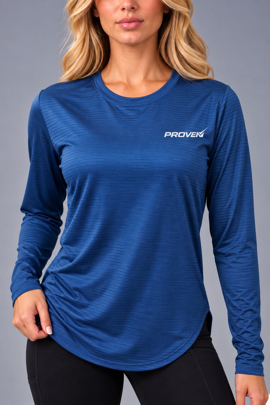 Blue long sleeve performance T-shirt by Proven Sportswear, designed for sports and active wear, with breathable fabric and athletic fit.