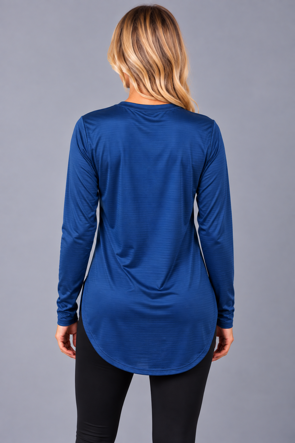 Blue long sleeve performance sports T-shirt by Proven Sportswear, showing lightweight fabric and athletic fit.