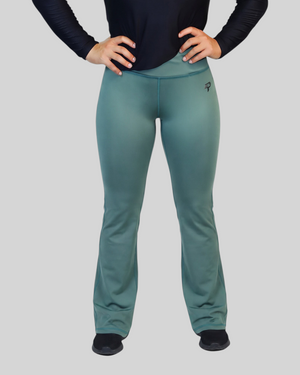 Olive green Flow Flare Leggings by Proven Sportswear, showing the fitted waistband and flare design on a mannequin.