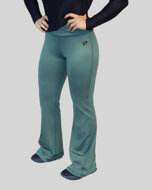 Olive green Flow Flare Leggings by Proven Sportswear, featuring a snug fit and stylish flare design, shown on a model.