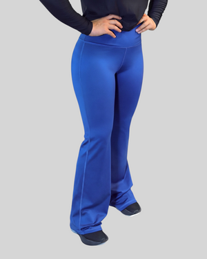 Navy blue flare leggings from Proven Sportswear with a high waist and comfortable fit, shown on a model.