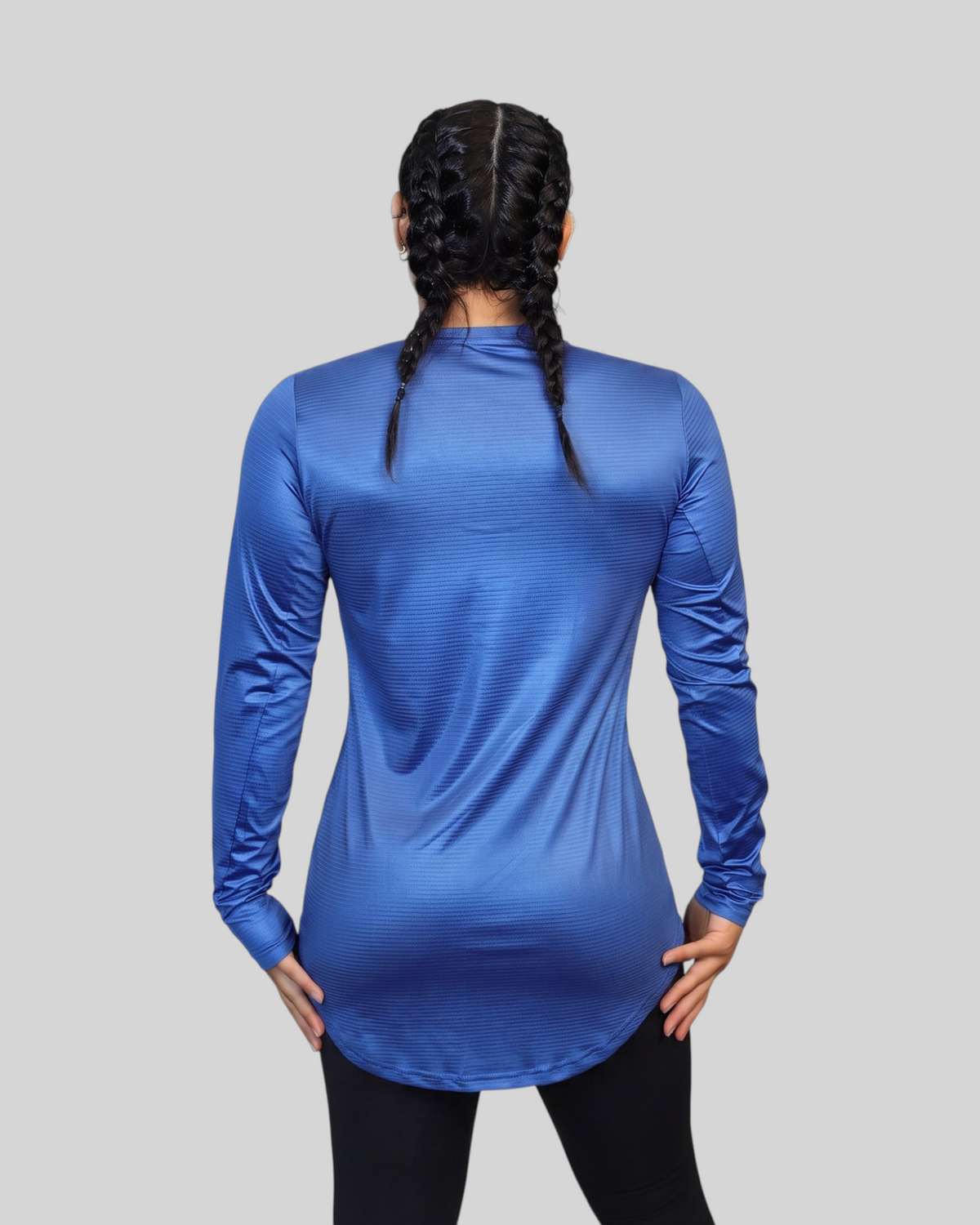 Blue long sleeve performance sports T-shirt by Proven Sportswear, featuring breathable fabric and athletic fit.
