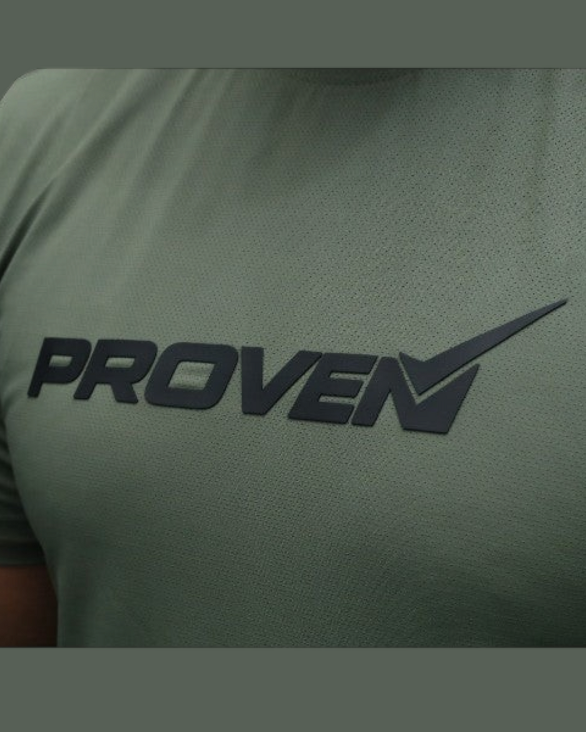 Olive green Proven Sportswear Essential Performance Tee sports T-shirt displayed on a hanger.