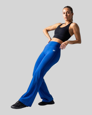 Navy blue flare leggings by Proven Sportswear displayed on a model, showcasing the stylish flared design and comfortable fit.