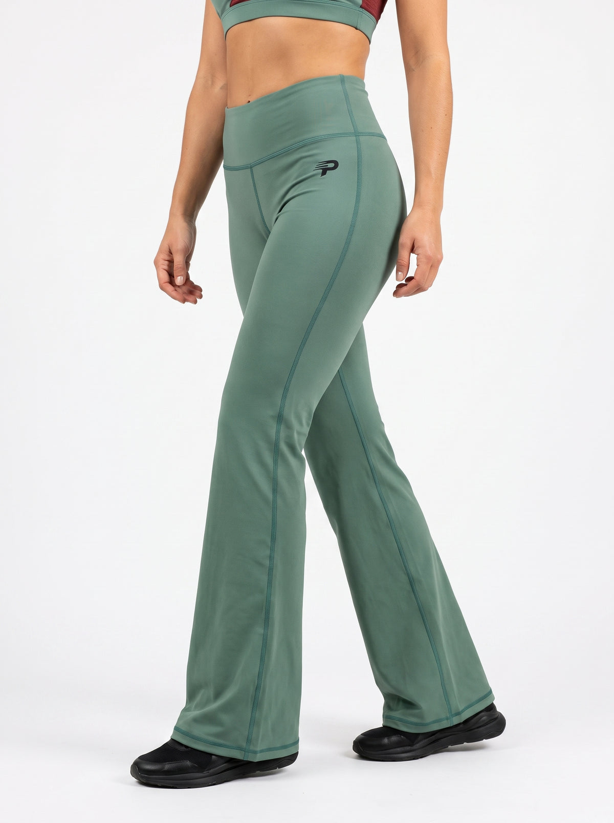 Olive green flare leggings by Proven Sportswear, made of stretchy fabric with a high waistband and stylish flare design.