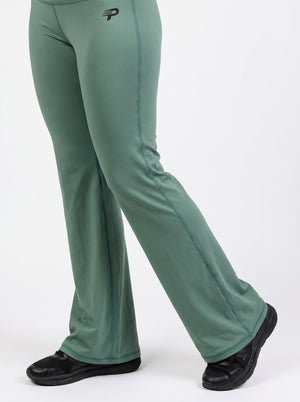 Olive green flare leggings by Proven Sportswear, shown on a model, featuring a high waist and stylish flared design.
