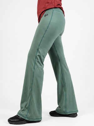 Olive Proven Sportswear flow flare leggings displayed on a model, showcasing the stylish, high-waisted design and flared leg detail.