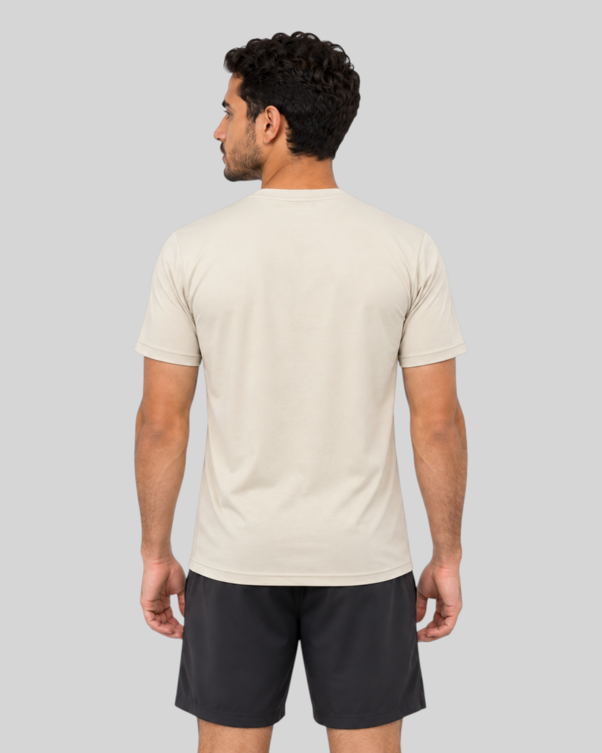 Desert Sand Proven Sportswear Essential Performance T-shirt displayed on a hanger, showcasing a lightweight, breathable sports tee.