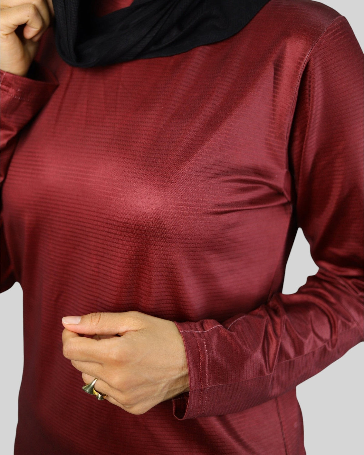 proven sport wear long sleeve performance t-shirt in maroon with a subtle textured fabric and athletic fit